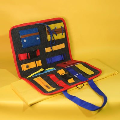 The busy book opened to showcase its engaging activities, including different textures and fasteners.