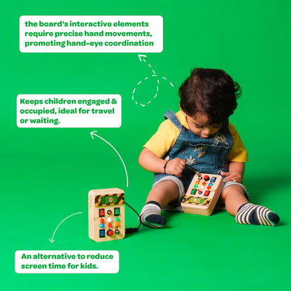 Toddler interacting with the Montessori Portable Switches Wooden Busy Board V1, pressing buttons and flipping switches.